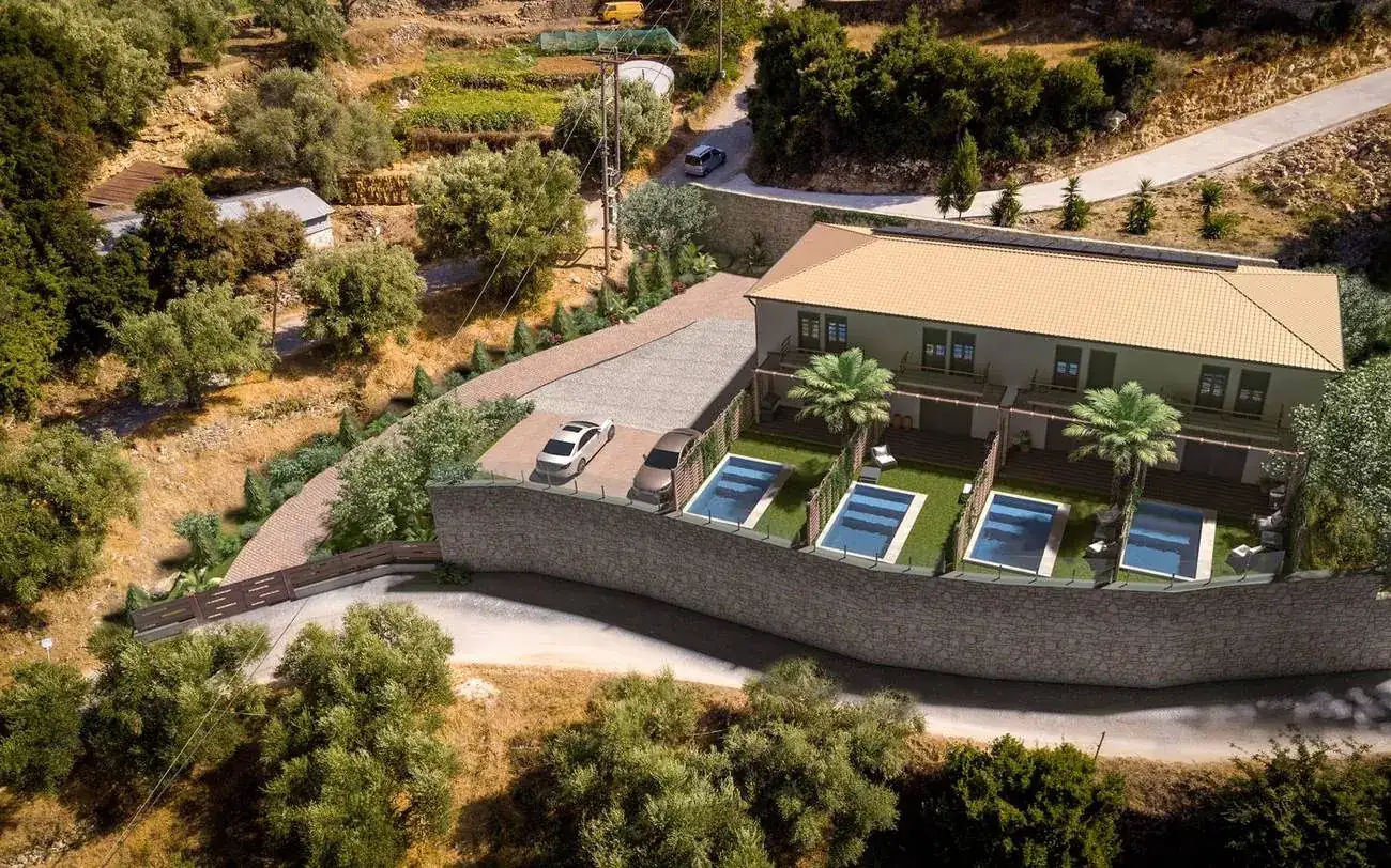 Aerial view of the Ela Home site on Zakynthos, olive groves and the village road